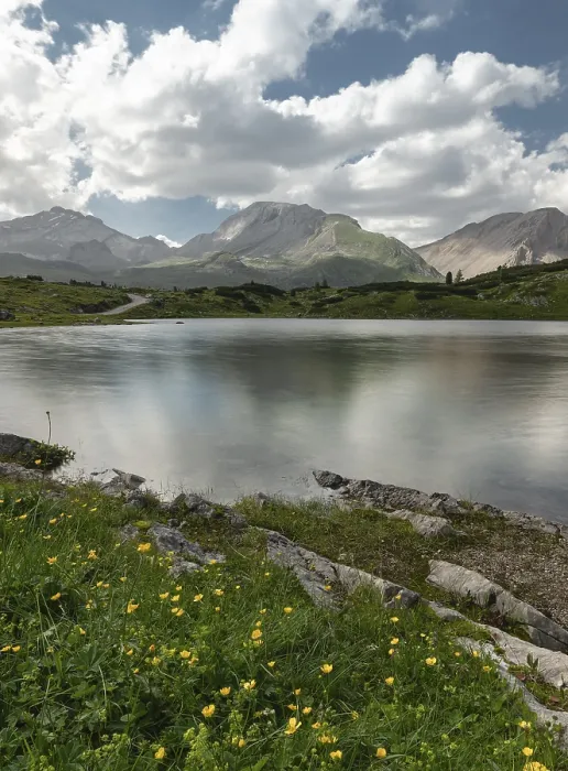 Framed Print : Tranquil lake view surrounded by mountains Framed Print : Tranquil lake view surrounded by mountains