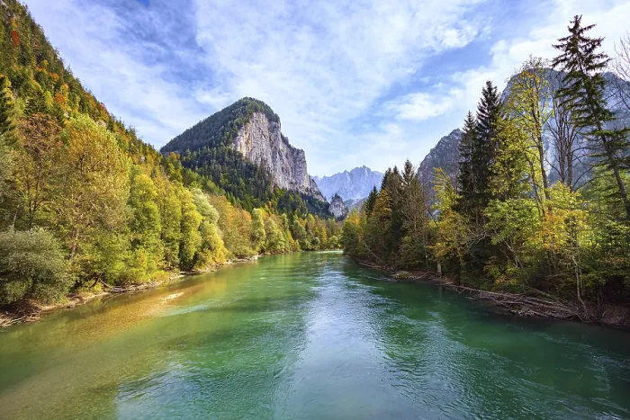 Framed Print : Travel to Austrian Alps. Magnificent slowly flowing river with cold greenish melt water Framed Print : Travel to Austrian Alps. Magnificent slowly flowing river with cold greenish melt water