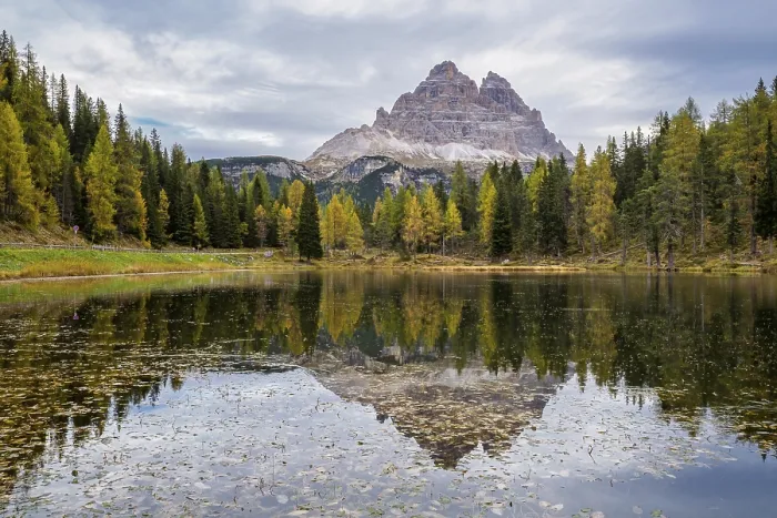 Framed Print : Tre Cime di Lavaredo peaks and Lake Antorno with sky reflection in calm water