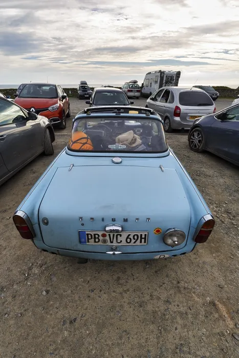 Framed Print : Triumph convertible, light blue vintage car in a car park Framed Print : Triumph convertible, light blue vintage car in a car park