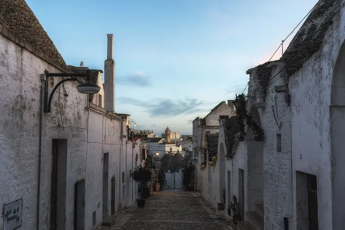 Framed Print : Trulli houses of Alberobello street in the morning Framed Print : Trulli houses of Alberobello street in the morning