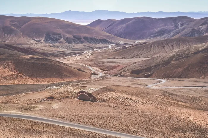 Framed Print : Twisting road from the high plateau to Quebrada de Humahuaca mountains in northern Argentina Framed Print : Twisting road from the high plateau to Quebrada de Humahuaca mountains in northern Argentina