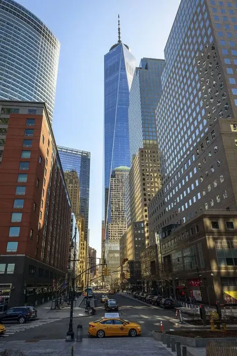 Framed Print : Typical yellow taxi, skyscrapers on Vesey Street