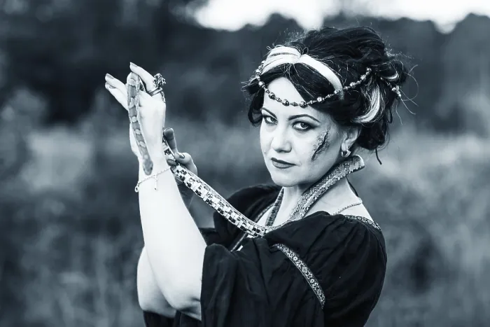 Framed Print : Ugly woman with snake. Witch conjure outdoors