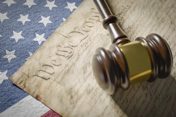 Framed Print : United states constitution, gavel and american flag resting on table
