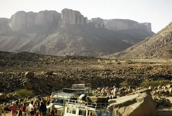 Framed Print : Unloading tourists and luggage, Landrover from MIntrek Expeditions Ltd, Tassili N'Ajjer National Park, near Djanet, Algeria, North Africa 1973, Africa