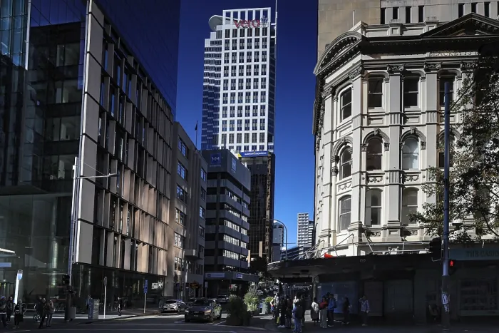 Framed Print : Urban scene along Queen Street with modern buildings against blue sky