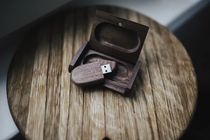Framed Print : USB drive in a wooden case with open lid on a rustic table Framed Print : USB drive in a wooden case with open lid on a rustic table