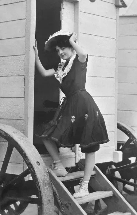 Framed Print : Vacation, swimwear, woman goes into the removal van