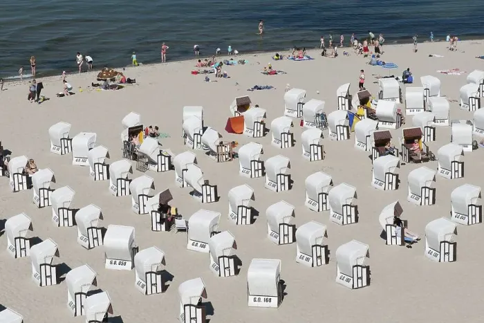 Framed Print : Vacationers and beach chairs on the beach of Sellin