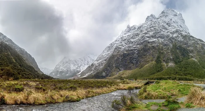 Framed Print : Valley with snow-capped mountains