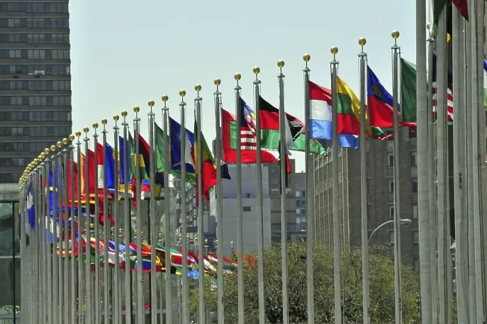 Framed Print : Various flags in front of the United Nations Headquarters Framed Print : Various flags in front of the United Nations Headquarters