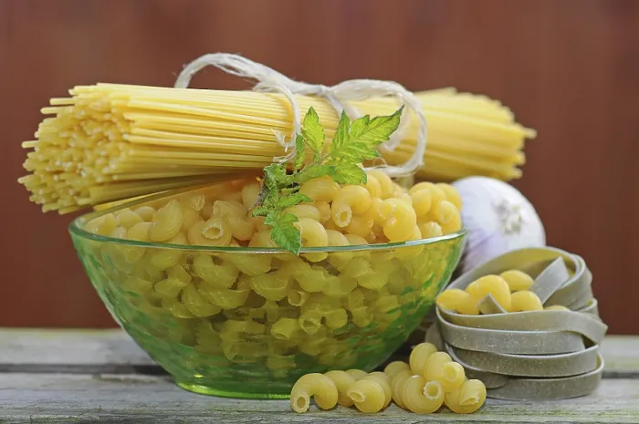 Framed Print : Various types of pasta with a glass bowl