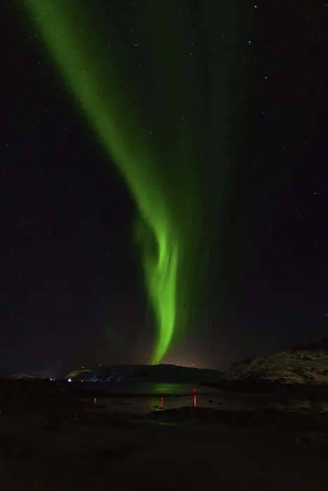 Framed Print : Vertical stream of green aurora over dark hills