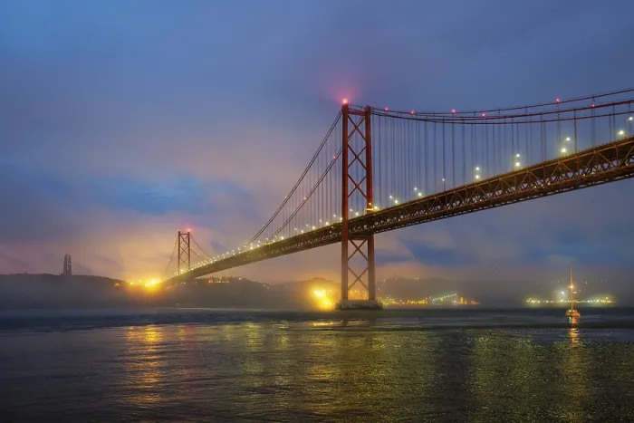 Framed Print : View of 25 de Abril Bridge famous tourist landmark of Lisbon connecting Lisboa