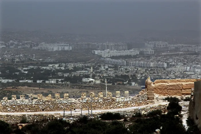 Framed Print : View of Agadir with the Kasbah and a large parking lot in the foreground Framed Print : View of Agadir with the Kasbah and a large parking lot in the foreground