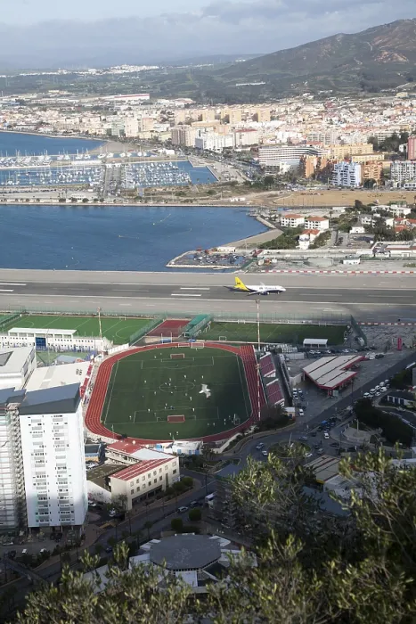 Framed Print : View over airport runway to Spanish town of La Linea from Gibraltar