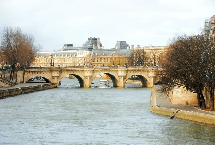 Framed Print : View of a bridge over the Seine river at sunset