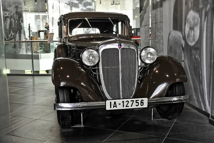 Framed Print : Front view of a brown classic car with classic design Framed Print : Front view of a brown classic car with classic design