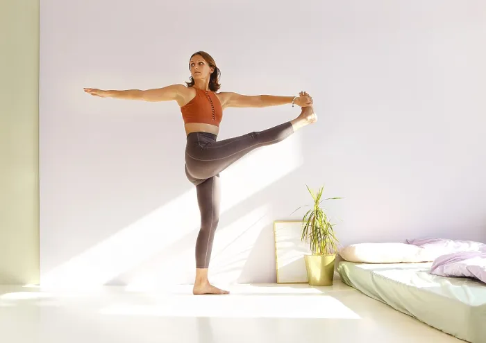 Framed Print : Side view of calm female in sportswear practicing yoga in Firefly pose while balancing and looking away Framed Print : Side view of calm female in sportswear practicing yoga in Firefly pose while balancing and looking away