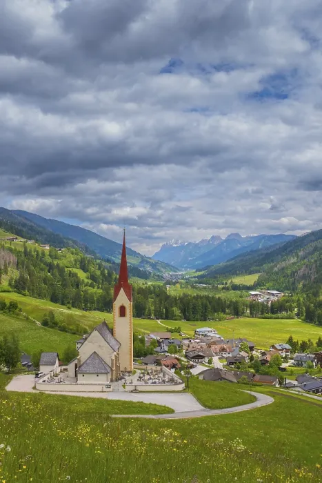 Framed Print : View of the church of Winnebach with the valley behind it
