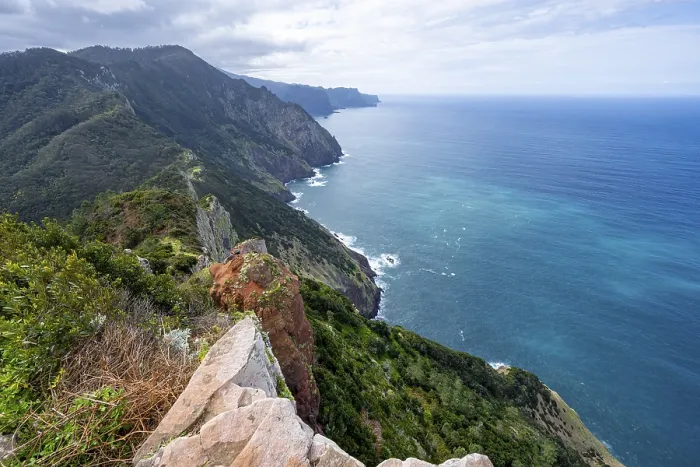 Framed Print : View of cliffs and mountains overgrown with forest