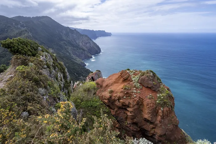 Framed Print : View of cliffs and mountains overgrown with forest