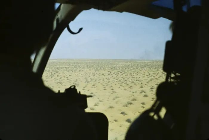 Framed Print : View into the cockpit of a Bell 206 JetRanger helicopter over the Arabian desert, Saudi Arabia oil industry 1979