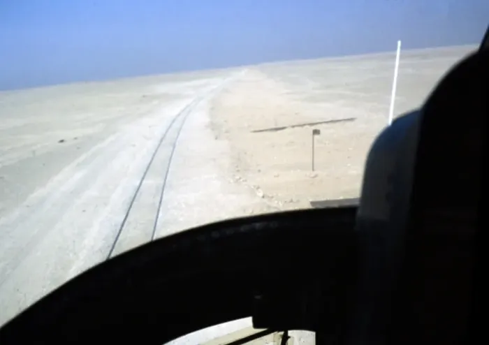 Framed Print : View from the cockpit of a helicopter over railway tracks in the desert, Saudi Arabia 1979 Framed Print : View from the cockpit of a helicopter over railway tracks in the desert, Saudi Arabia 1979