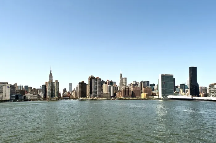 Framed Print : View of the east side of Manhattan from the ferry across the East River