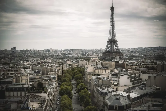 Framed Print : A view of the Eiffel Tower amidst the Parisian cityscape under an overcast sky in Paris