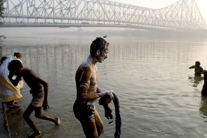 Framed Print : View of Howrah Bridge (Rabindra Setu) from Ghat On The River Hooghly A miracle of engineering skill