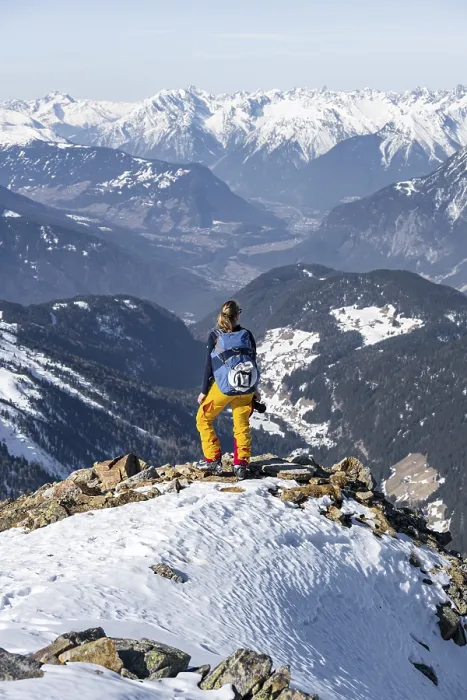 Framed Print : View of the Inn Valley, mountaineer at the summit of the Pirchkogel