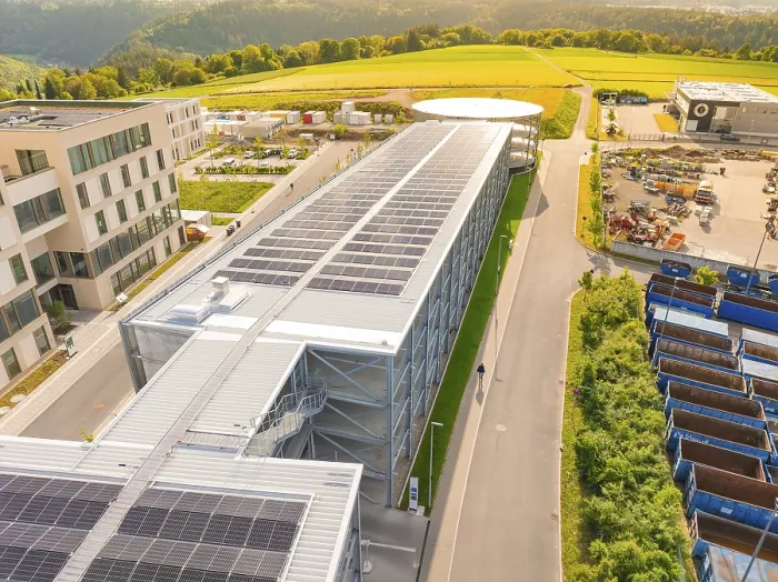 Framed Print : View of a long building roof with solar panels in a progressive Framed Print : View of a long building roof with solar panels in a progressive