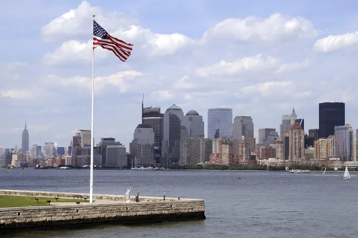 Framed Print : View of Manhattan and Hudson river with flag of USA Framed Print : View of Manhattan and Hudson river with flag of USA