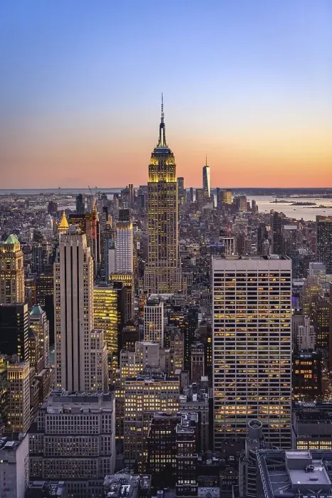 Framed Print : View of Midtown and Downtown Manhattan and Empire State Building from Top of the Rock Observation Center at sunset