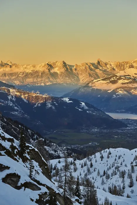 Framed Print : View from Mount Kitzsteinhorn on snow covered mountains down to Zell am See Framed Print : View from Mount Kitzsteinhorn on snow covered mountains down to Zell am See