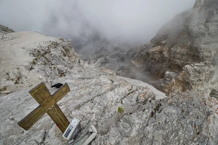 Framed Print : View obscured by clouds from the top of the Cima di Mezzo mountain (3154 m) with a beautiful cross on the top
