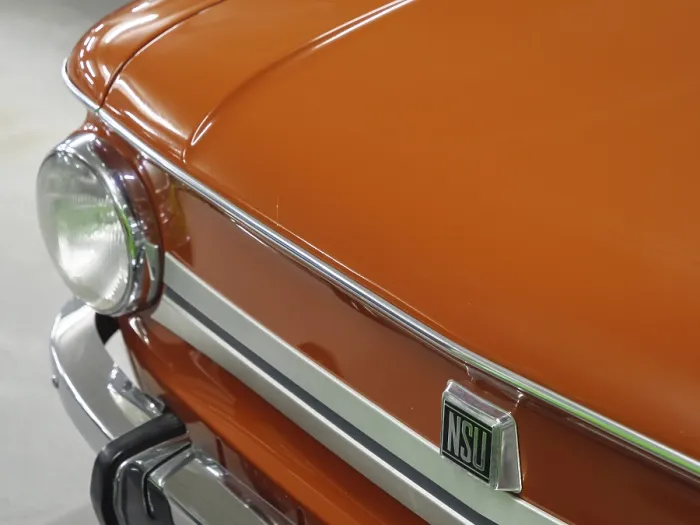 Framed Print : Front view of an orange-coloured NSU classic car with shiny details and headlights