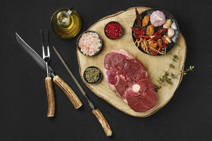 Framed Print : Top view of raw fresh lamb center cut leg steak with spice