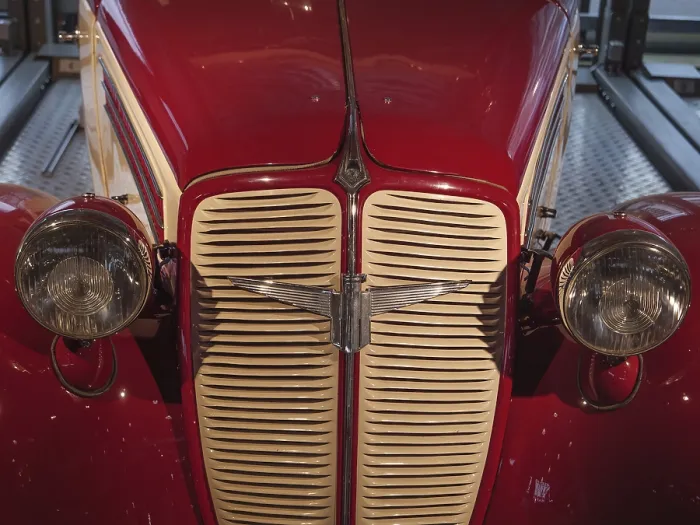 Framed Print : Front view of a red classic car