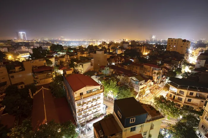 Framed Print : A view over rooftops at night towards the north and Red River in Hanoi Framed Print : A view over rooftops at night towards the north and Red River in Hanoi