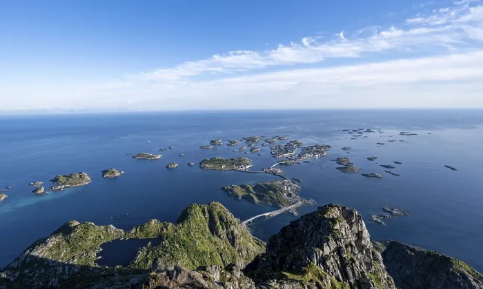 Framed Print : View of the sea and archipelago islands with the village of Henningsvaer