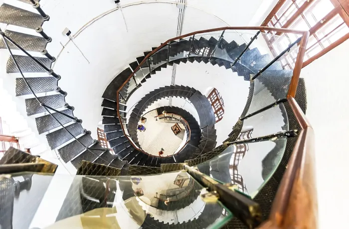 Framed Print : Down view of a spiral staircase in old water tower in Staraya Russa