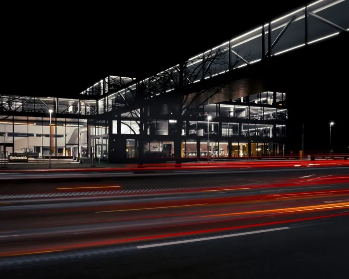Framed Print : View across a street to the main entrance of the Continental administration building at night