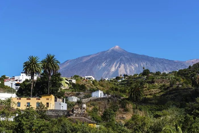 Framed Print : View of the Teide volcano from Icod de los Vinos on a sunny day with blue sky