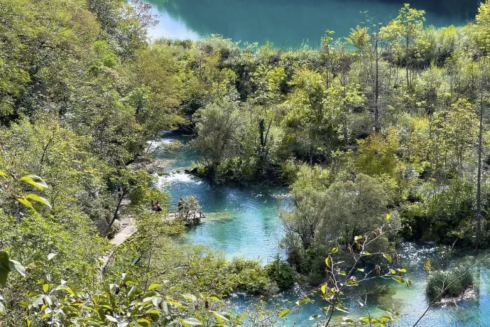 Framed Print : View of turquoise cascades with wooden walkway