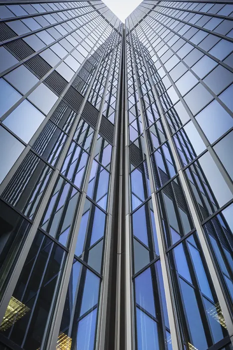 Framed Print : View upwards along an ultra-modern glass facade of a skyscraper with geometric shapes