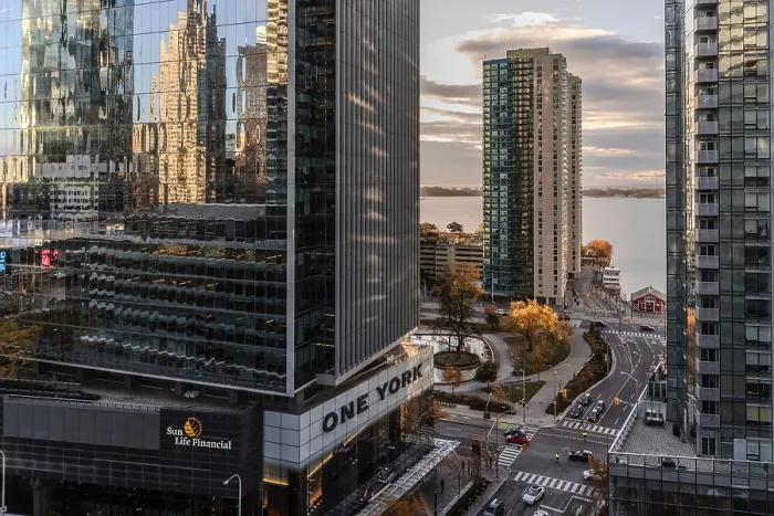 Framed Print : View of urban skyline at dusk with skyscrapers and waterfront visible in Toronto