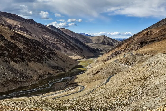Framed Print : View of valley with road near Tanglang la Pass